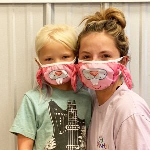 Mommy and daughter wear their Rabbit AniMasks with 3-D ears and teeth.  Students and their educators stay safe.