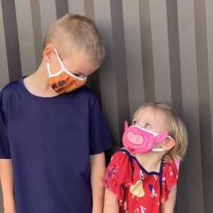 Big brother and Sister love their Giraffe and Pig AniMasks!